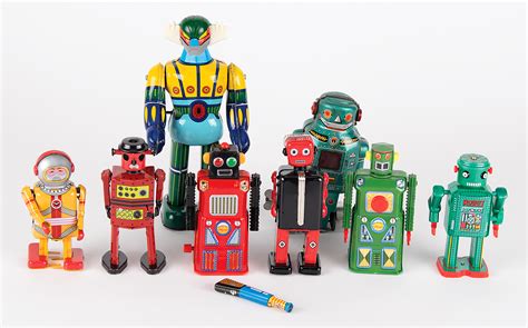 Vintage Lot of (8) Tin Litho Wind-up Toy Robots from the collection of