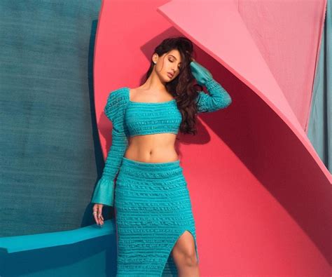 Nora Fatehi Aces Fun Beach Look With This Red Bikini Top And Denim Shorts News