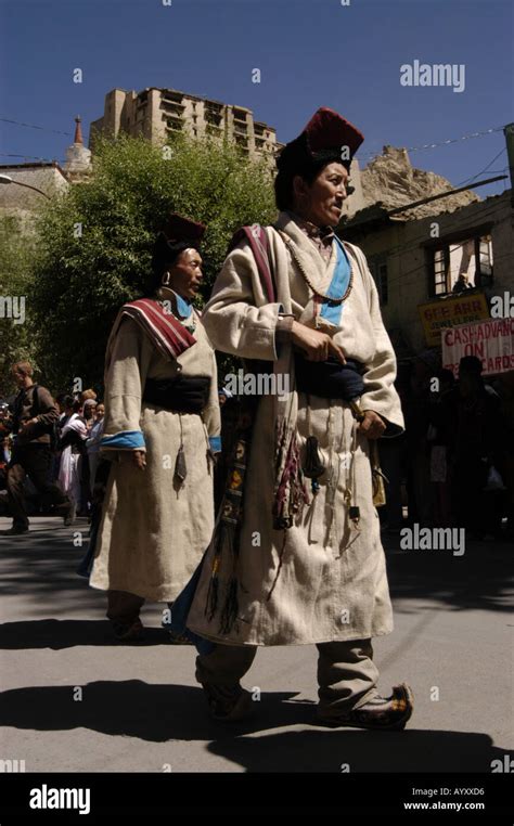 Traditional Dress Ladakhi Men With Leh Palace In Background During