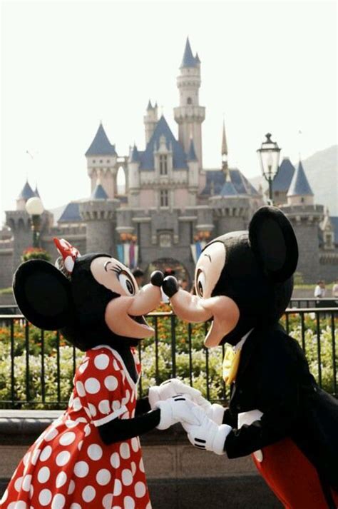 Mickey And Minnie Kissing In Front Of The Castle