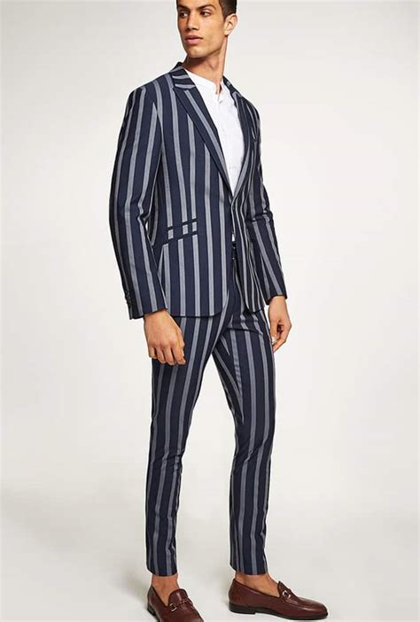 Why You Should Own A Pinstripe Suit And How To Wear It Fashionbeans