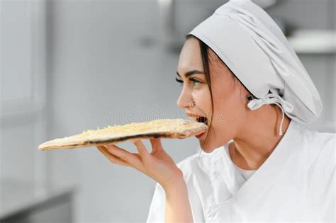 Funny Woman Chef Trying To Bite Pizza Stock Photo Image Of Happy