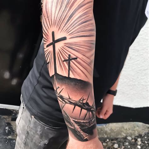 meaning   cross tattoos exploring symbolism