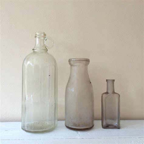 Set Of 3 Vintage Clear Glass Bottle Collection Glass Etsy Glass Bottles Clear Glass