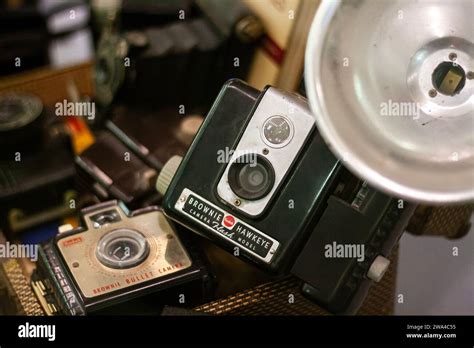 A Kodak Brownie Hawkeye Flash Model Camera And Kodak Brownie Bullet