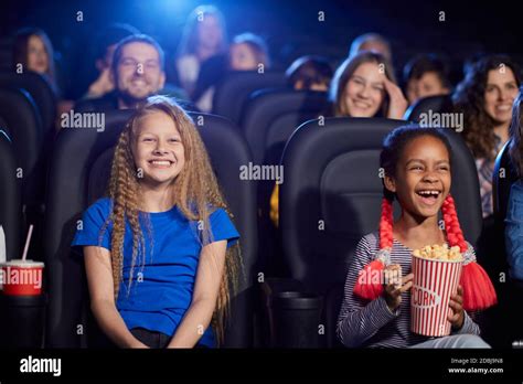 Kids watching movie theater hi-res stock photography and images - Alamy