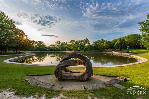 Summer Sunrise Over Rock Sculpture At Kettering Civic Commons Park No