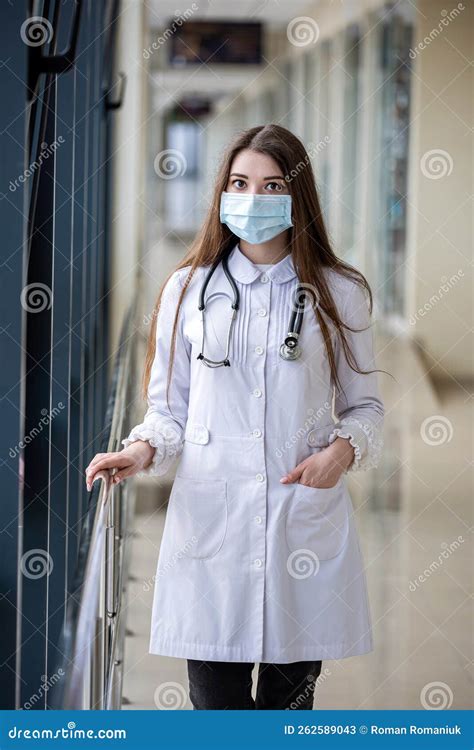 Portrait Of A Successful Smiling Nurse Wearing A Mask To Protect