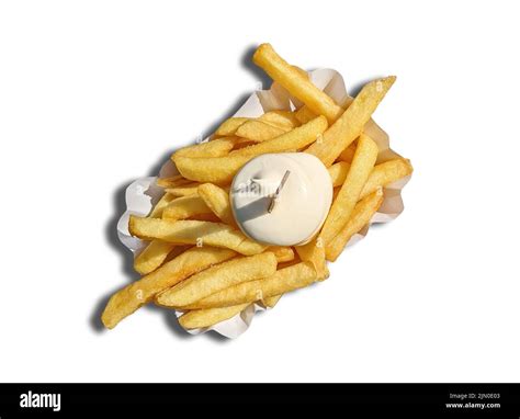 Top Down View Of Serving Of French Fries With Mayonnaise On Paper Plate