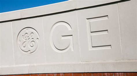 ge plans  sell french finance unit  industrial push stock news