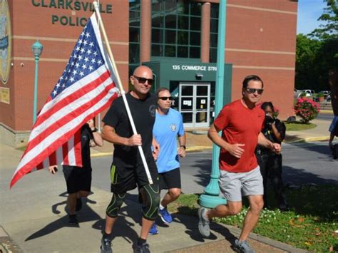 Clarksville Police Carry Torch Across Town For Special Olympics