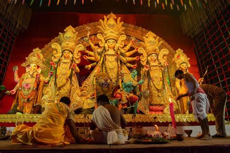 Hindu Priests Worshipping Goddess Durga With Pradip Ashtami Puja