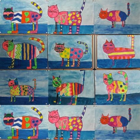 Several Colorful Cats Painted On Paper In Different Colors