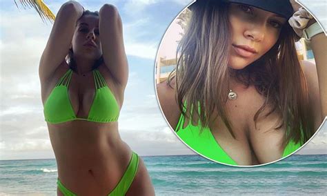 Imogen Thomas Puts On A VERY Busty Display As She Slips Into An Eye Catching Green Bikini