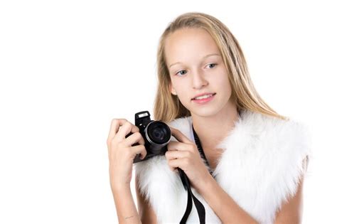 Premium Photo Blonde Girl Posing With Her Camera
