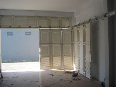 PINTU GARASI SLIDING TIKUNG REL PINTU GARASI 082233323880