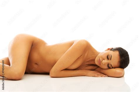 Side View Naked Woman Lying With Head On Arm Stock Photo Adobe Stock