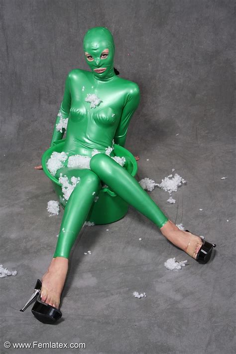 Busty Babe In Green Latex Jumpsuit Posing W XXX Dessert Picture 11
