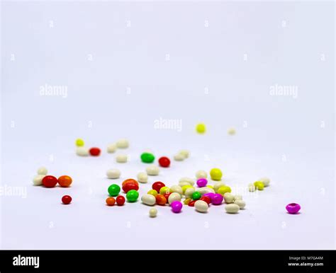 Multiple Colored Sugar Candy In White Background Stock Photo Alamy