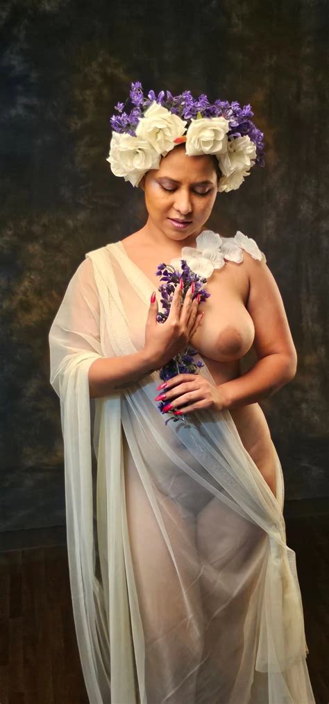 Desi MILF Tina Nandi Posing Almost Nude In A White Transparent Braless