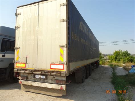 Полуприцеп шмитц тент 2002г. 90 м3.