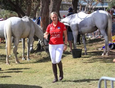 Zara and Mike Tindall remain silent as they ignore Harry to enjoy