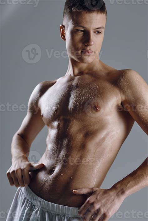 Athlete With Naked Torso Holds Hands On Belt On Gray Background Cropped View 21993947 Stock