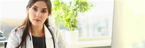 Woman Doctor In Medical Gown At Workplace Stock Photo Image Of