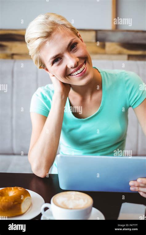 Pretty Blonde Using Laptop Computer Stock Photo Alamy