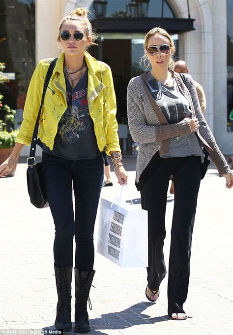 Miley Cyrus Exposes Side Boob In A Gaping Iron Maiden T Shirt Daily Mail Online