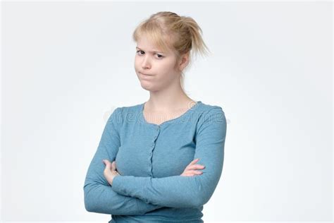Upset Unsatisfied Blonde Woman Standing With Arms Folded Stock Photo Image Of Girlfriend