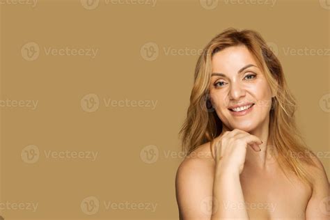 Radiant Mature Woman With Glowing Skin Stock Photo At Vecteezy