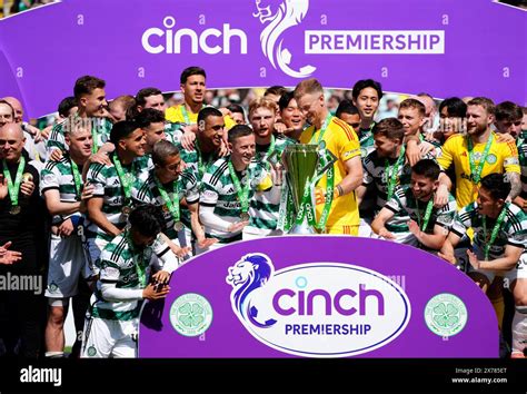 Celtic Goalkeeper Joe Hart And Callum Mcgregor Hold The Trophy As They