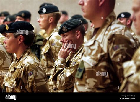 Soldiers of the 1st Battalion of The Royal Green Jackets prepare to ...