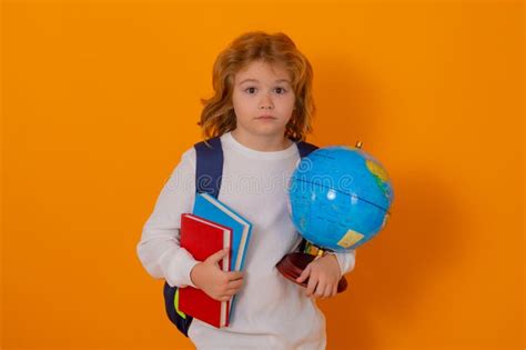 School Boy With World Globe And Book Kid Boy From Elementary School
