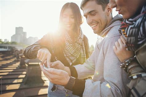 group  friends   mobile phone  stocksy contributor lumina