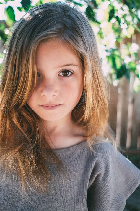 "Portrait Of Young Girl Modeling Stylish Clothes" by Stocksy ...