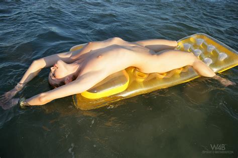 Busty And Pale Teen Showing Off Her Naked Body On An Inflatable Mattress Iamxxx