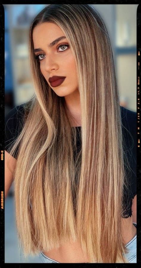 Contrasting Highlights And Straight Hair Look Hair Color Balayage Honey Blonde Hair Long