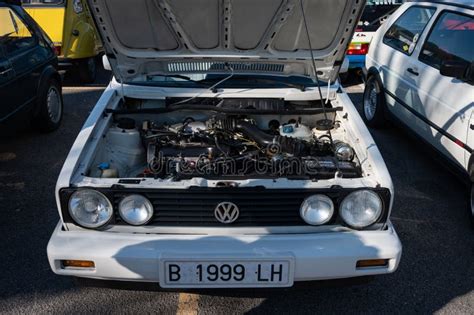 Detail Of The Engine Of An Old White Volkswagen Golf Second Generation
