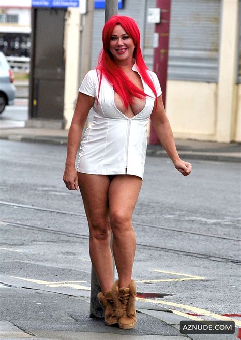 Lisa Appleton Sexy In A Red Wig For Local Sex Shop Saint And Sinners Photo Shoot In Blackpool