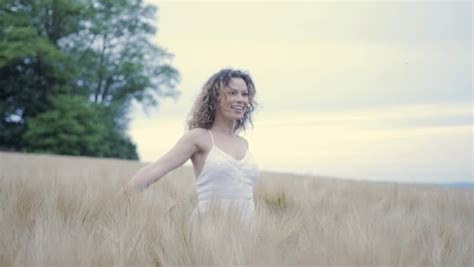 Beach Bikini Girl Lying On Beach Sand In Water In Tropical Paradise Looking At Camera Sexy