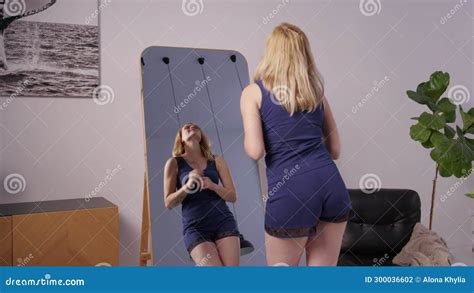 Happy Pretty Mature Woman In Nightie Enjoying Appearance And Look In Mirror Stock Footage