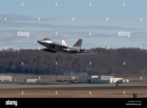 A U S Air Force F 22 Raptor Assigned To The 525th Fighter Squadron 3rd Wing Takes Off From