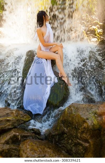 Naked Girl Sitting On Rock By Stock Photo Shutterstock