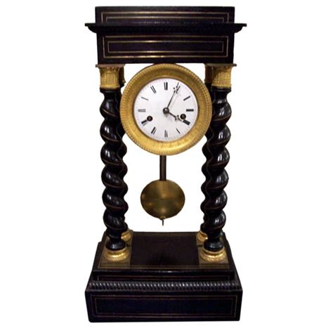 French Gilt Bronze Mounted Ebonized Portico Clock For Sale At 1stdibs