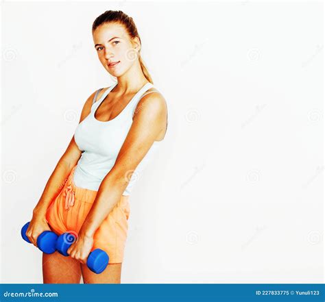 Junge Ziemlich Schlanke Blonde Frau Mit Dummbell Isoliert Fr Hliches L Cheln Das Ihr Konzept