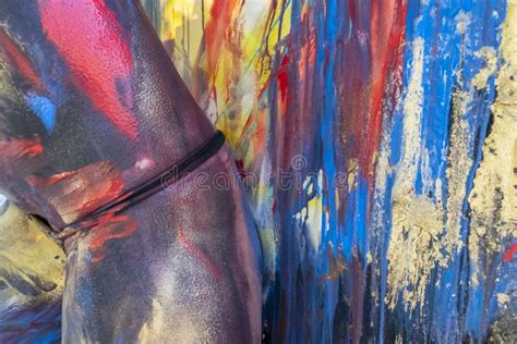 Naked Female Is Being Painted With Colorful Paint In A Home Environment Stock Photo Image Of