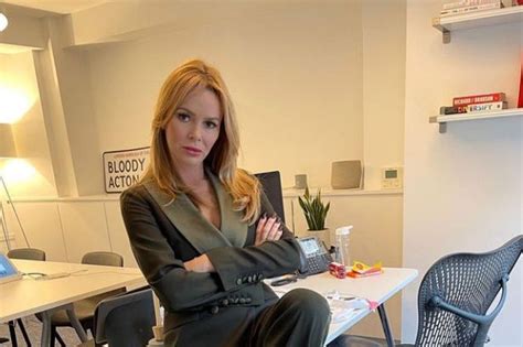 Amanda Holden Branded Seriously Stunning As She Reclines On Desk In