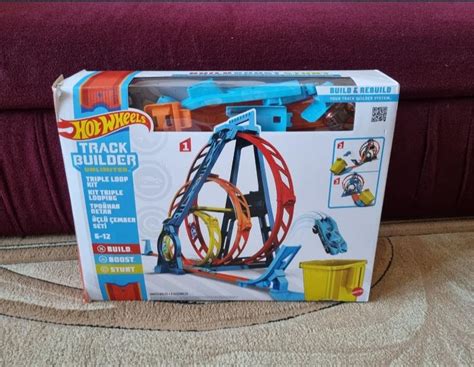 Трек hot wheels потрійна петля серії track builder ціна 2012 грн у каталозі Автомобільні